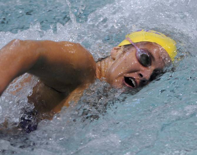 LSU sophomore Stacey Stanfield takes a breath during the women's 200 yard freestyle event on Friday October 18, 2013 at the LSU vs. Georgia swim meet in the Natatorium.