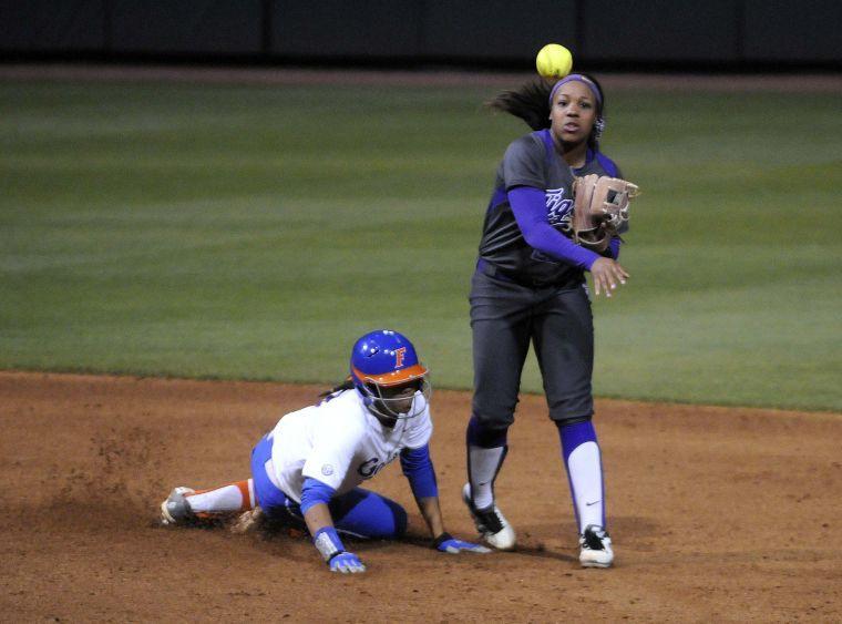 LSU sophomore infielder and pitcher Bianka Bell (27) makes a play during the Lady Tigers' 3-2 victory against the Gators on March 15, 2014 at Tiger Park.