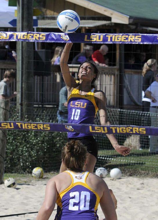 LSU freshman Mimi Eugene (10) spikes the ball Wednesday, March 12, 2014 during a scrimmage at Mango's Outdoor Volleyball.