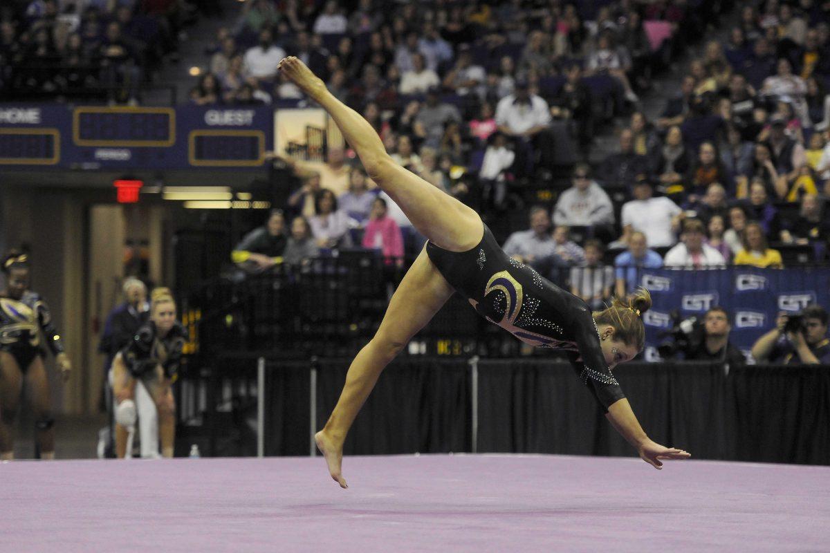 LSU junior Jessie Jordan perfroms on floor Friday, March 14, 2014 during the Lady Tigers' 197.800-195.000 victory against Kentucky in the PMAC