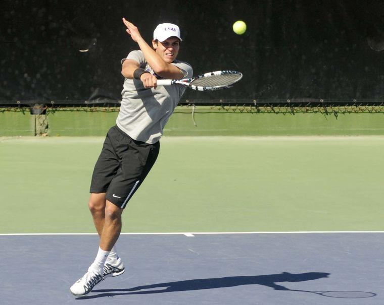 LSU freshman Eric Perez makes a hit on the ball during a match against George Washinton University on March 13, 2014 at the W.T. &#8220;Dub&#8221; Robinson Stadium.