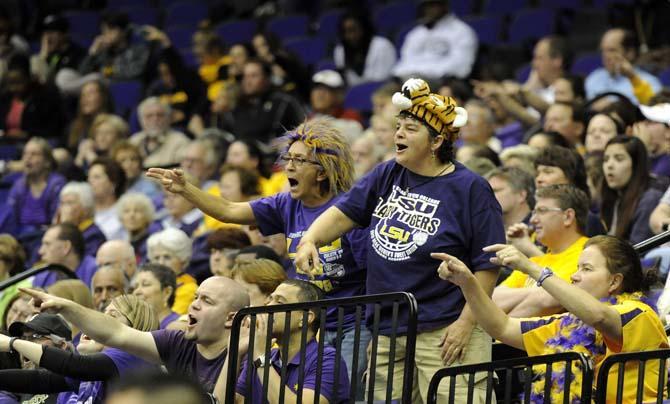 Lady Tigers come from behind to upset West Virginia, 76-67