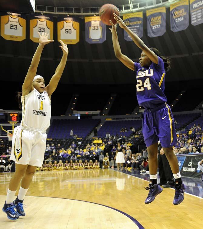 Lady Tigers come from behind to upset West Virginia, 76-67