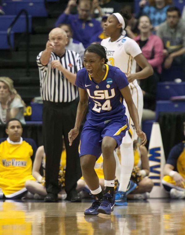 LSU junior guard DaShawn Harden (24) celebrates after a goal Tuesday, March 25, 2014, during the Tigers' 76-67 win against West Virginia in the PMAC.