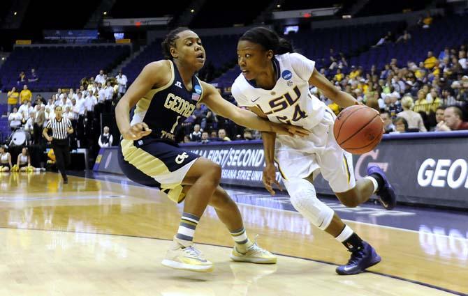 LSU junior guard DaShawn Harden (24) moves the ball towards the goal Sunday, March 23, 2014, during the Tigers' 98-78 victory against Georgia Tech in the PMAC.