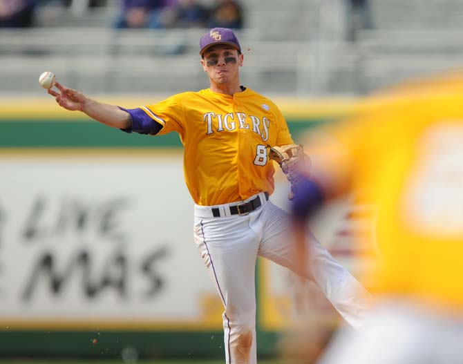 LSU sophomore infielder Alex Bregman (6) throws the ball to first base Sunday, March 23, 2014 during the Tigers' 2-2 tie against Georgia at Alex Box Stadium.