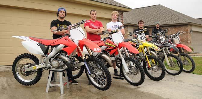 [Right to Left] LSU construction managament senior Jordan Hughes, sociology sophomore Jacob Hughes, petroleum engineer junior Logan Van Way, preident of the LSU Motorcross Club, psychology junior Dillion Guillot, and business junior Chase Foster are in the LSU motorcross club together. They frequently ride together on Thursday nights.