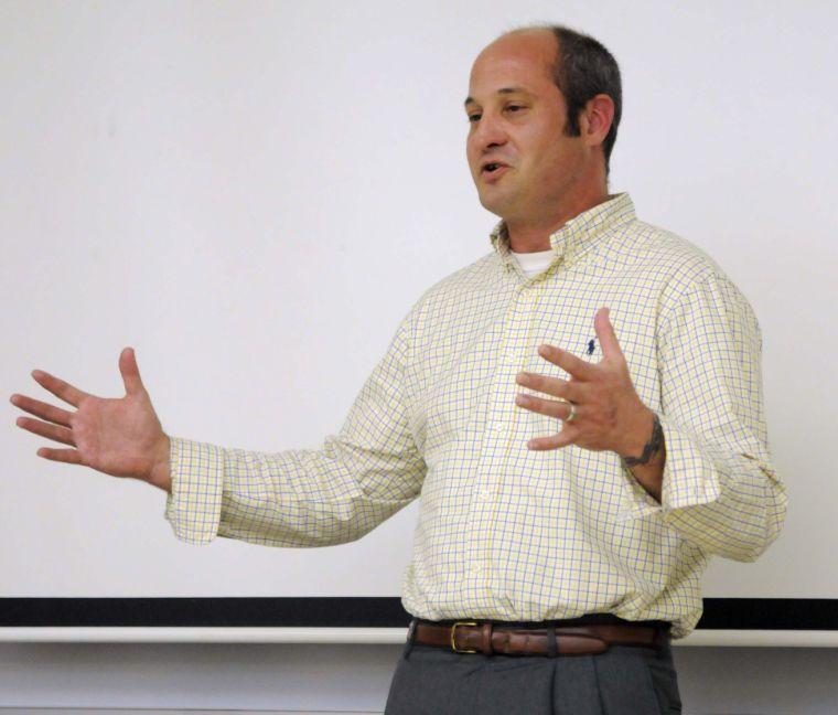 Libertarian candidate for US Senate Brannon McMorris speaks to the College Libertarians at LSU Monday, March 17, 2014 in Coates Hall.