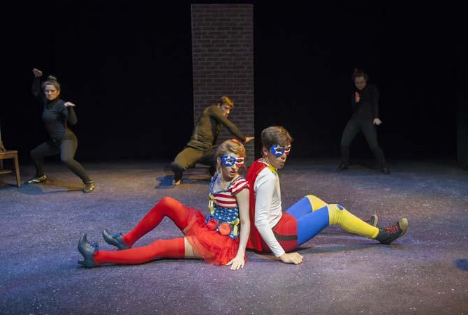 Captain Justice (right, theatre junior Jacob Voisin) speaks to Lady Liberty (left, theatre junior Yvette Bourgeois) on Sunday, March 9, 2014 during a dress rehearsal of Vampire Cowboy in the Music and Dramatic Arts Building.