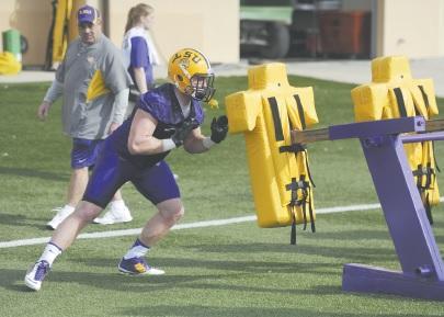 LSU senior linebacker D.J. Welter pushes pads Monday during spring practice at the Charles McClendon Practice Facility.