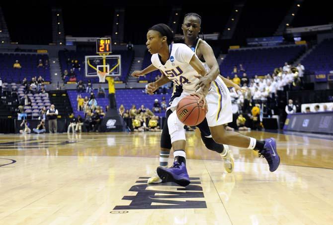 LSU junior guard DaShawn Harden (24) moves the ball towards the goal Sunday, March 23, 2014, during the Tigers' 98-78 victory against Georgia Tech in the PMAC.