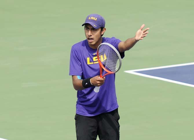 LSU sophomore Boris Arias disagrees with a call Friday, March 7, 2014 during a tennis match against Alabama in W.T. "Dub" Robinson Stadium.