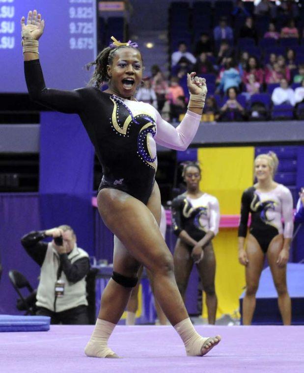 LSU junior all-around gymnast Lloimincia Hall dances during her floor routine Friday, March 7, 2014 during the Tigers' 197.500-195.525 victory against NC State in the PMAC.
