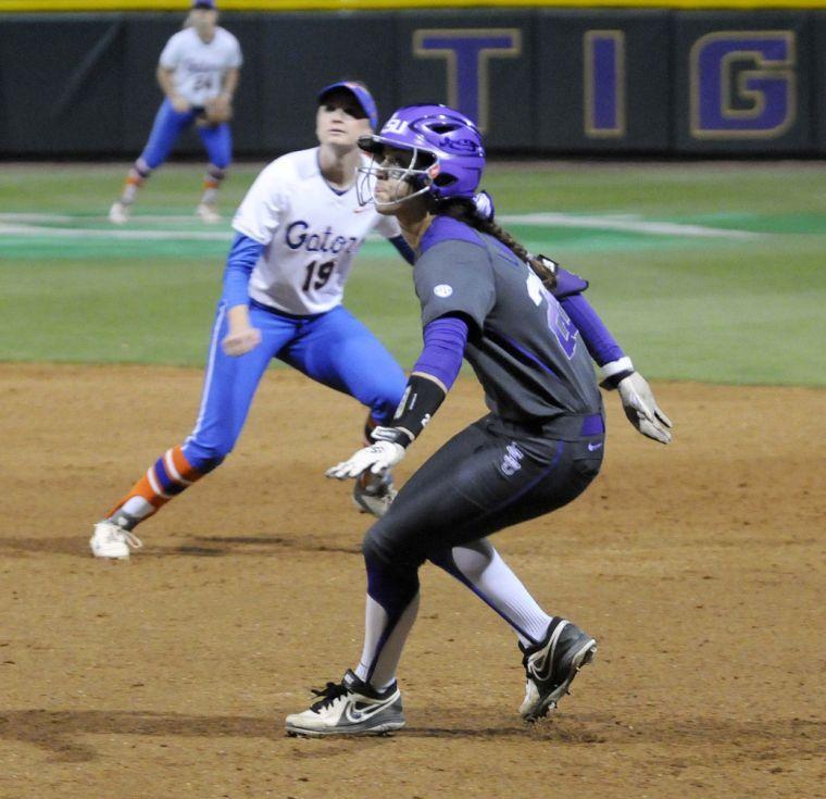 LSU freshman outfielder Bailey Landry (26) steals a base during the Lady Tigers' 3-2 victory against the Gators on March 15, 2014 at Tiger Park.