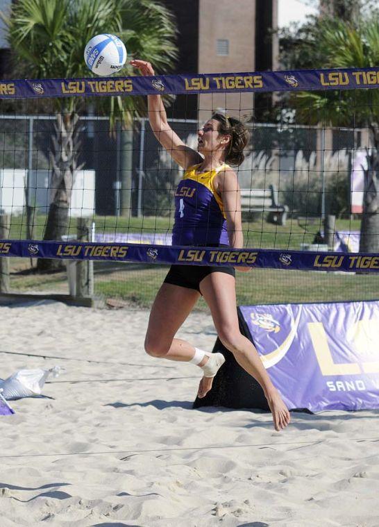 LSU senior Meghan Mannari (4) spikes the ball Wednesday, March 14, 2014 during a scrimmage at Mango's Outdoor Volleyball.