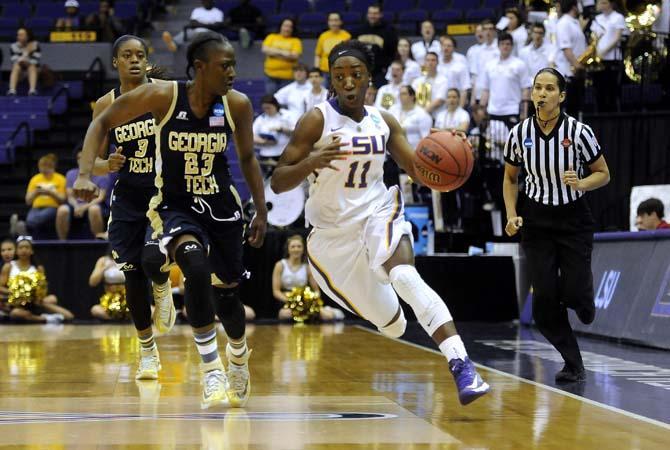 LSU freshman guard Raigyne Moncrief (11) moves the ball down the court Sunday, March 23, 2014, during the Tigers' 98-78 victory against Georgia Tech in the PMAC.