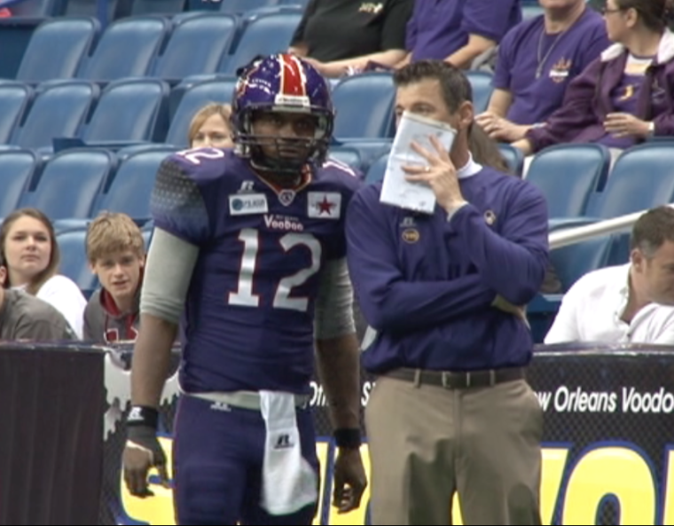 New Orleans Voodoo starting quarterback Ryan Perrilloux receives instruction from head coach Pat O'Hara during Saturday's 37-26 loss to the Cleveland Gladiators. 