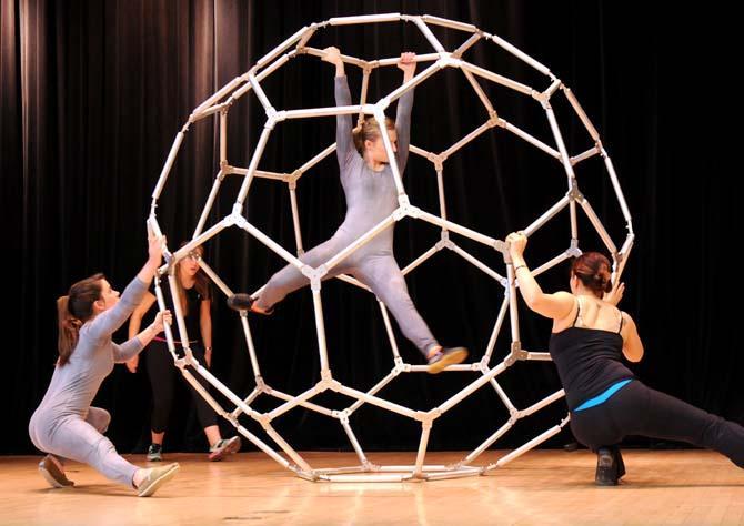 Students from the University's Theatre department perform in a sphere designed by the College of Engineering on Monday, March 10, 2014 at the first Discover Research Day in the Student Union's Cotillion Ballroom.