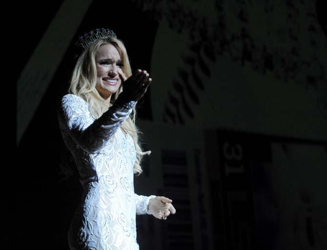 Miss LSU-USA 2013 Hilary Tuttle walks on stage for the last time Sunday, March 23, 2014, at the Miss LSU-USA pageant in the Union Theatre.