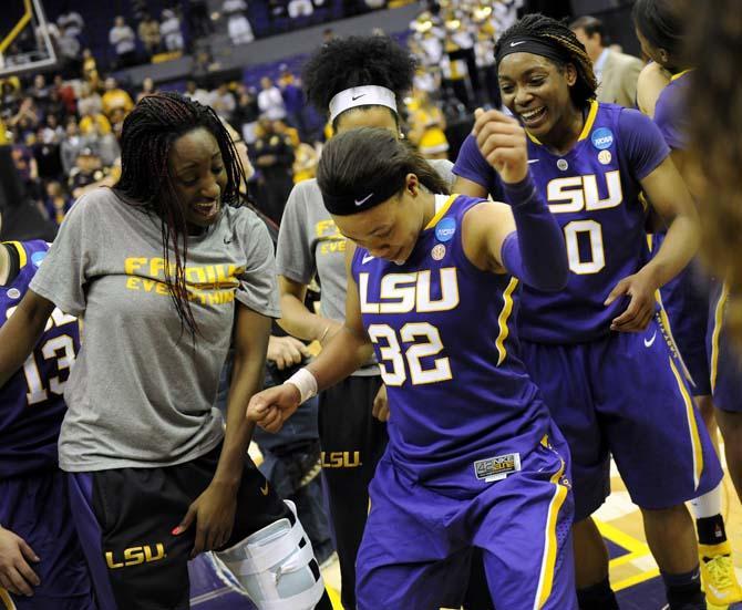 Lady Tigers come from behind to upset West Virginia, 76-67