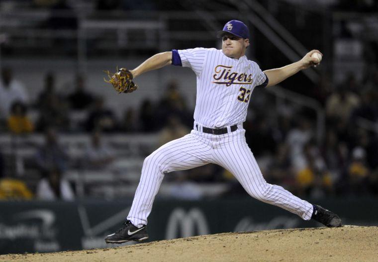 LSU junior pitcher Henri Faucheux (33) launches the ball during the Tigers' 9-0 victory against Southern Alabama on Wednesday, March 19, 2014 at Alex Box Stadium.