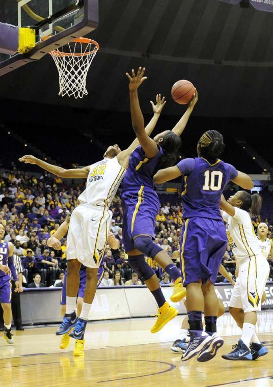 Lady Tigers come from behind to upset West Virginia, 76-67