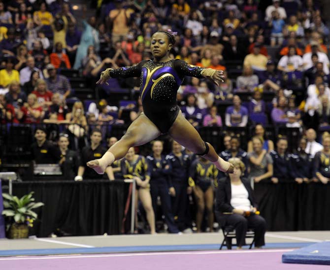 LSU junior all-around Lloimincia Hall leaps during her floor routine Saturday, April 5, 2014, during an NCAA Gymnastics Regional meet in the PMAC. The Tigers won the met with a school-record score of 198.325.