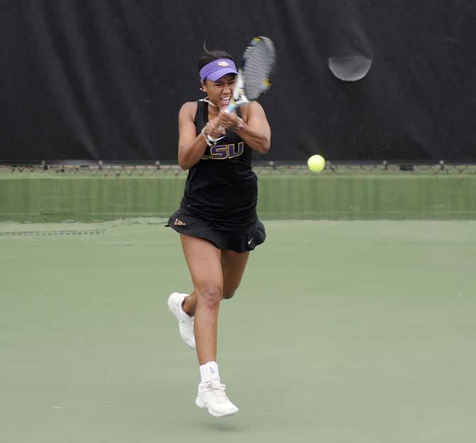 LSU junior Noel Scott returns a serve Sunday, April 6, 2014, during the Tigers' loss to Georgia in W.T. "Dub" Robinson Stadium.