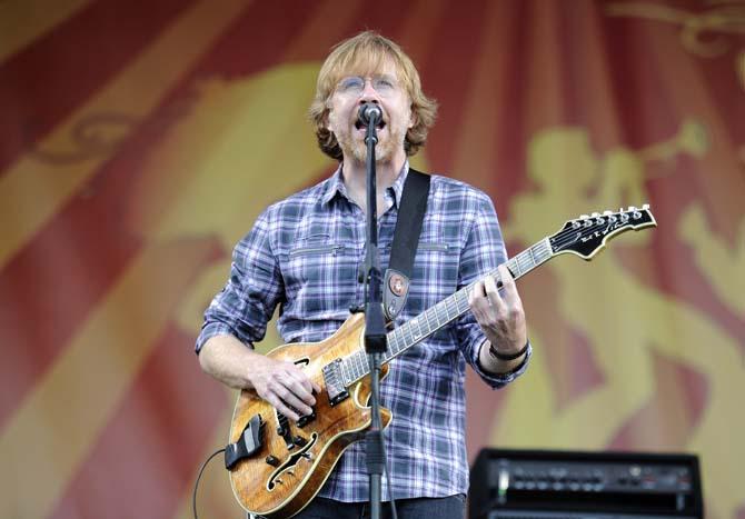 Trey Anastasio of Phish sings and strums Saturday, April 26, 2014, during the New Orleans Jazz and Heritage Festival.