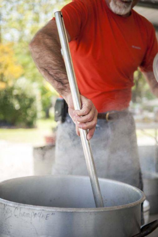 The crawfish are stirred until cooked Sunday, April 20, 2014 in New Iberia, La.