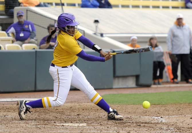 LSU sophomore infielder Bianka Bell hits a ground ball Sunday, April 6, 2014, during the Tigers' 9-0 loss to Tennessee in Tiger Park.