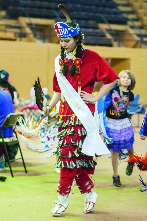 Jaclyn Wagers, a jingle dress dancer, performs Saturday, April 5, 2014 during the 5th Annual LSU Native American Student Organization Spring Pow Wow held at Parker Coliseum.