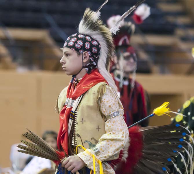 Kaliq Sims dances Saturday, April 5, 2014 during the 5th Annual LSU Native American Student Organization Spring Pow Wow held in Parker Coliseum.