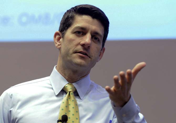 In this March 20, 2014 photo Republican Rep. Paul Ryan answers constituents questions during a listening session at the Snap-on Headquarters in Kenosha, Wis. Ryan is making poverty a signature issue as he tries to broaden his appeal ahead of a possible presidential run in 2016. But he&#8217;s had to defend himself and his message against allegations of racism. (AP Photo/Kenosha News, Kevin Poirier)