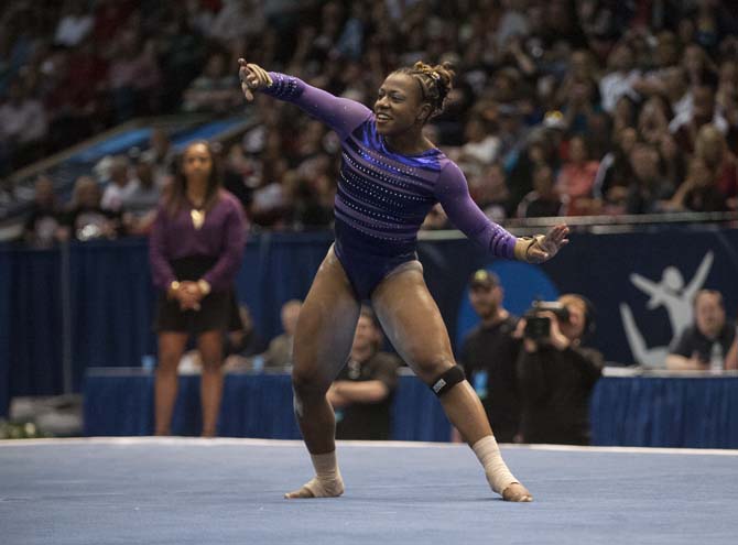 LSU junior all-around gymnast Lloimincia Hall performs her floor routine Saturday, April 19, 2014 during the fourth rotation of the NCAA Super Six Finals in Birmingham, Ala.