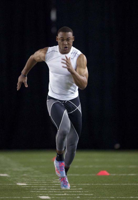 Former LSU quarterback Jordan Jefferson runs the 40 yard dash on Wednesday, April 9, 2014 in the LSU Indoor Practice Facility.