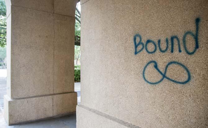 Graffiti has been written in between Coates and Himes Hall.