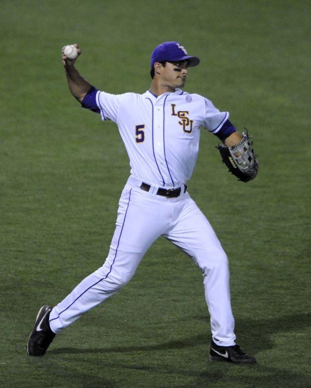 LSU junior outfielder Chris Sciambra (5) returns the ball to the pitcher's mound during the Tigers' 3-0 victory against Mississippi State on Friday, April 4, 2014 at Alex Box Stadium.