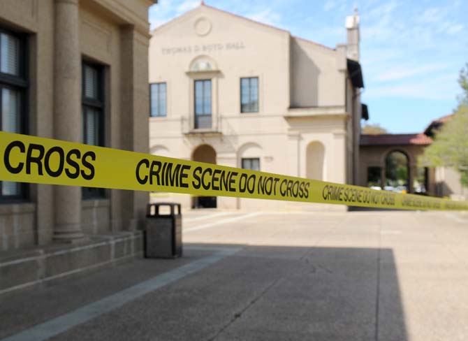 LSUPD taped off the surrounding area near Thomas D. Boyd Hall on Monday, April 7, 2014 after a call was received from the Bursar's Office about suspicious packages found near the building.