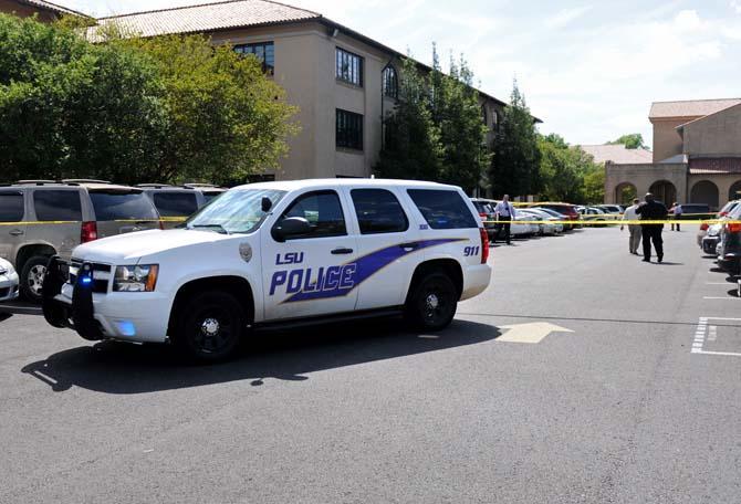 LSUPD taped off the surrounding area near Thomas D. Boyd Hall on Monday, April 7, 2014 after a call was received from the Bursar's Office about suspicious packages found near the building.