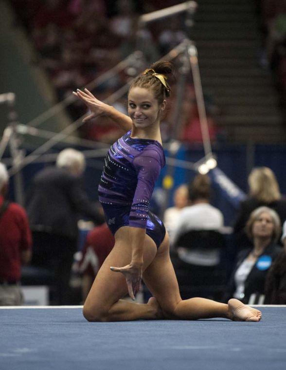 LSU junior all-around gymnast Jessie Jordan poses at the beginning of her floor routine Saturday, April 19, 2014 during the fourth rotation of the NCAA Super Six Finals in Birmingham, Ala.