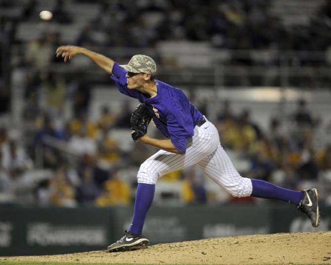 LSU freshman pitcher Parker Bugg (46) throws the ball Tuesday, April 22, 2014, during the Tigers' 6-0 win against Tulane in Alex Box Stadium.