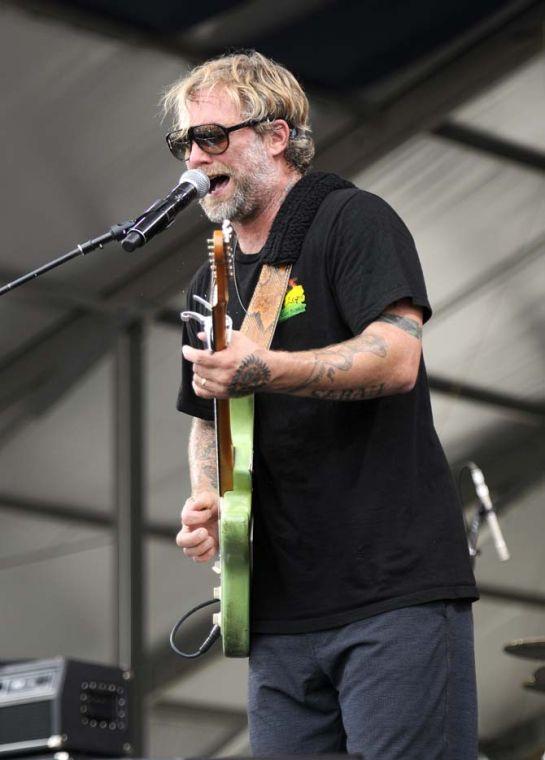 Sewdish-born Anders Osbourne plays the guitar Saturday, April 26, 2014, at the 2014 New Orleans Jazz and Heritage Festival.