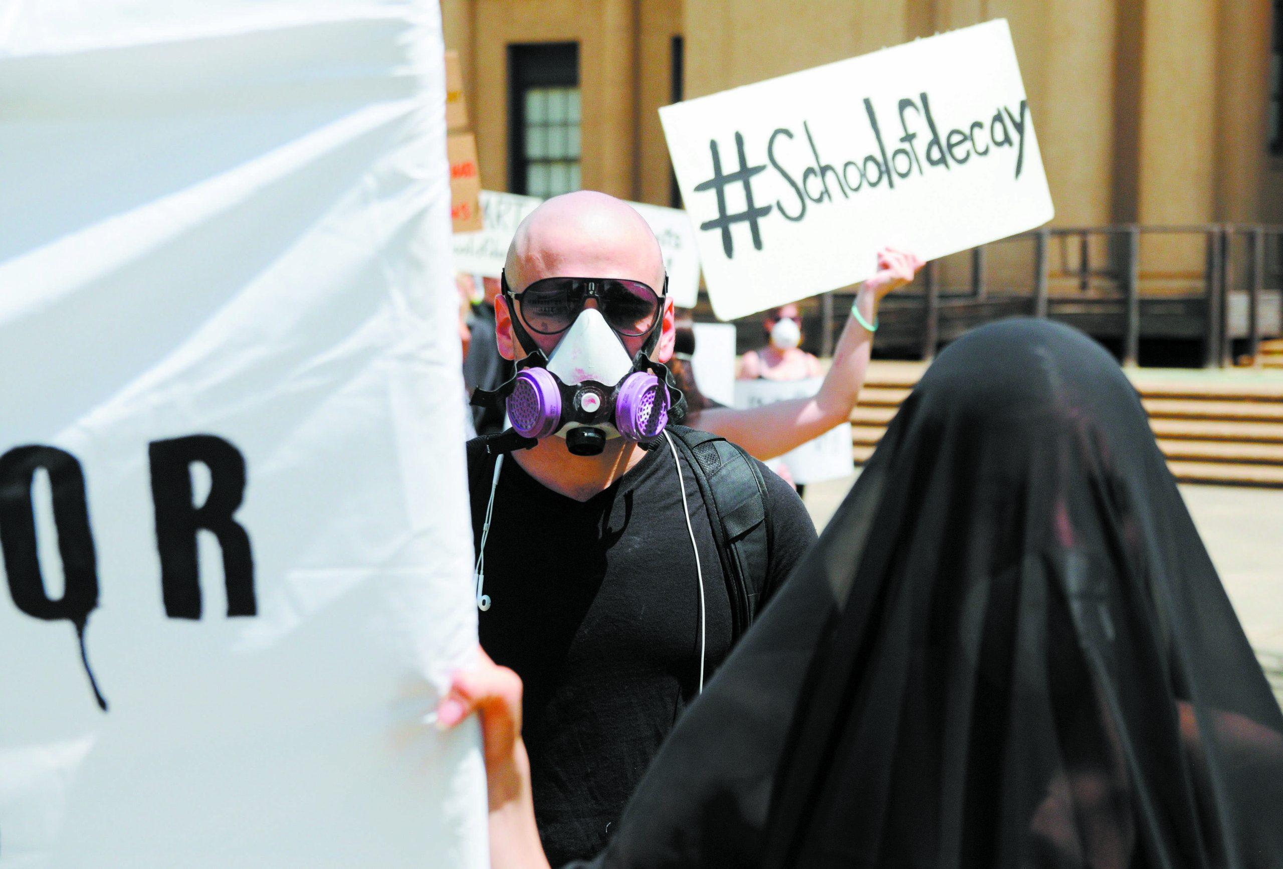 Students march around campus to protest Studio Arts Building conditions