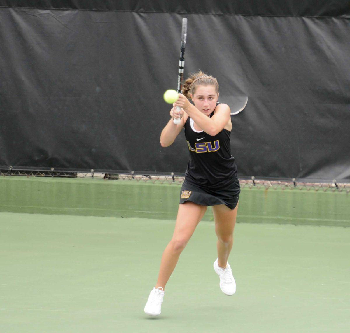 LSU sophomore Ella Taylor hits the ball Sunday, April 6, 2014, during the Tigers' loss to Georgia in W.T. "Dub" Robinson Stadium.