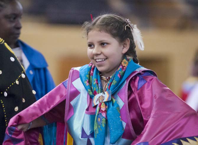 Kyla Sims dances Saturday, April 5, 2014 during the 5th Annual LSU Native American Student Organization Spring Pow Wow held in Parker Coliseum.