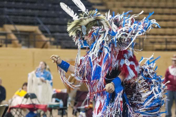 Casey Murphy performs a grass dance Saturday, April 5, 2014 during the 5th Annual LSU Native American Student Organization Spring Pow Wow held in Parker Coliseum.