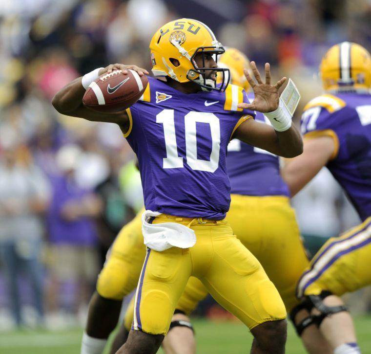 LSU sophomore quarterback Anthony Jennings (10) passes the ball Saturday, April 5, 2014 during the white squad's 42-14 victory against the purple squad in the National L Club Spring Game in Tiger Stadium.