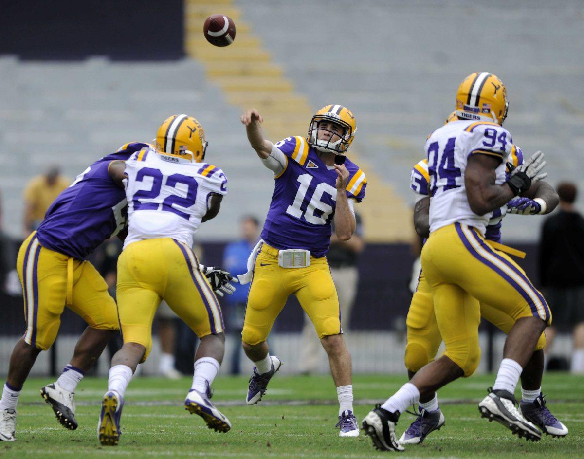 LSU junior quarterback Brad Kragthorpe (16) throws the ball Saturday, April 5, 2014 during the white squad's 42-14 victory against the purple squad in the National L Club Spring Game in Tiger Stadium.