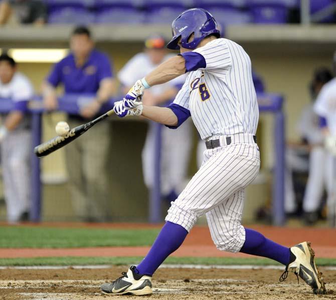 LSU sophomore infielder Alex Bregman (8) swings at the ball Wednesday, April 2, 2014, during the Tigers' 10-3 victory against McNeese in Alex Box Stadium.